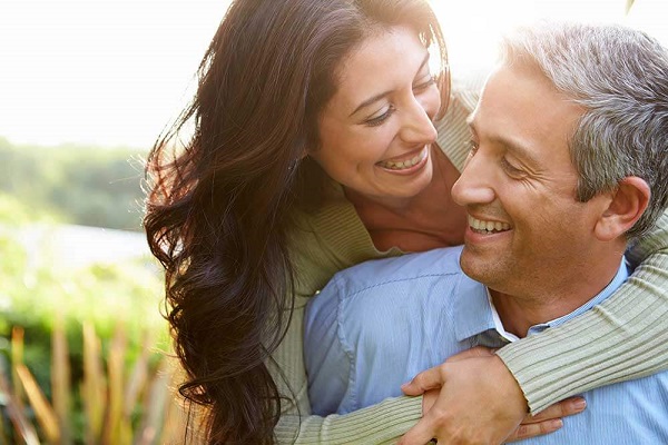 couple hugging and smiling