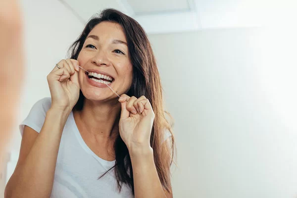 performing oral hygiene routine