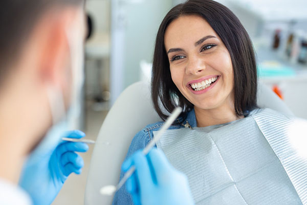 patient smiling at the dentist